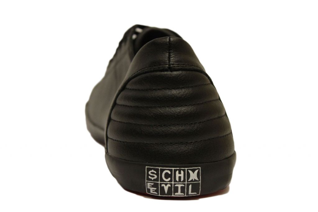 Cranium black leather with white skull toe cap