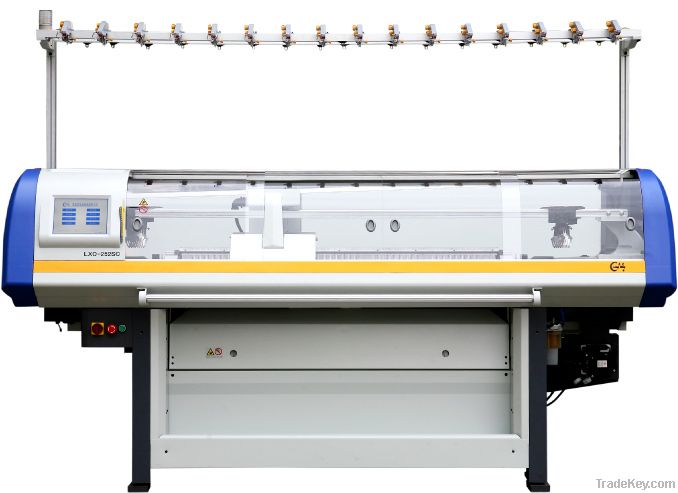 Computerized flat bed knitting machine