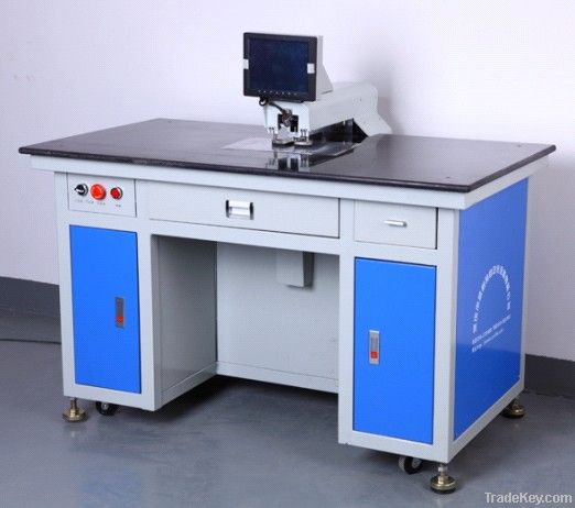 Automatic hole punching machine