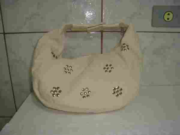 Synthetic or canvas women handbags