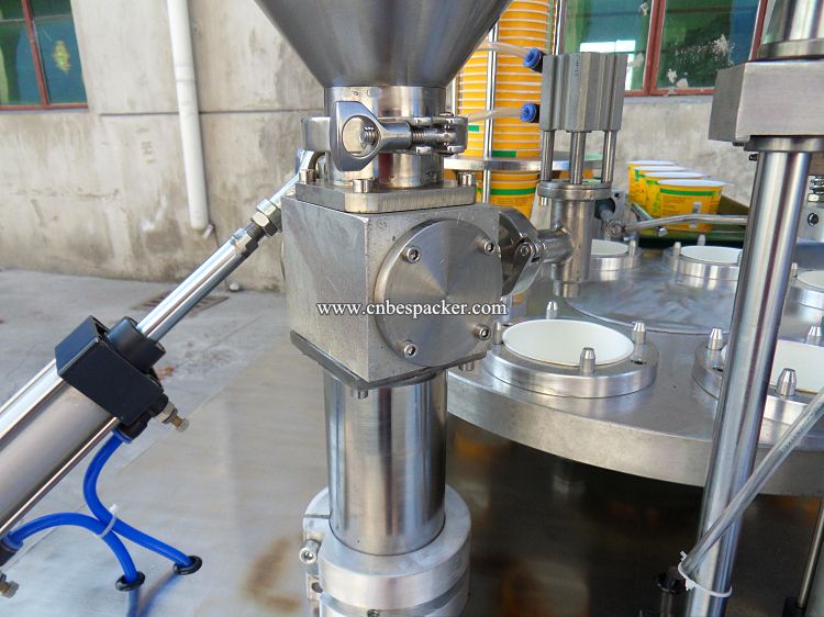 Automatic paper cup filling and sealing machine