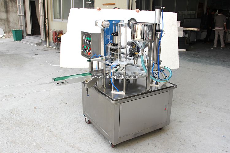 Rotary cup roll film filling and sealing machine