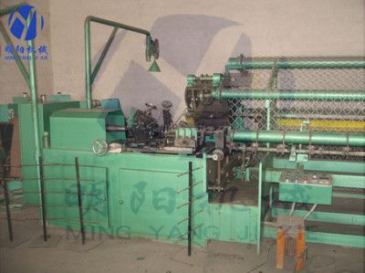 Automatic chain link fence machine