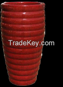 Modern tall urns for garden pots, red vases