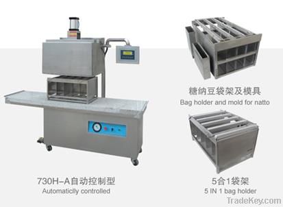 Vertical hot-vacuum packaging machine