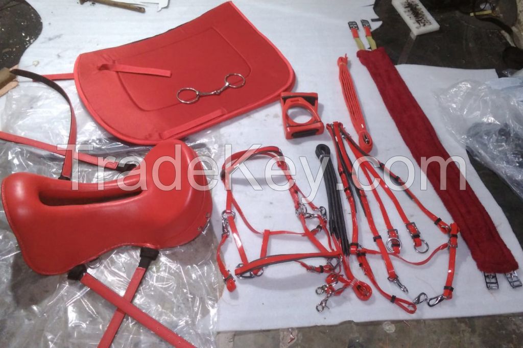Genuine imported material endurance saddle set with saddle pad,girth,pvc bridle and breast plate,plastic stirrups and steel bits