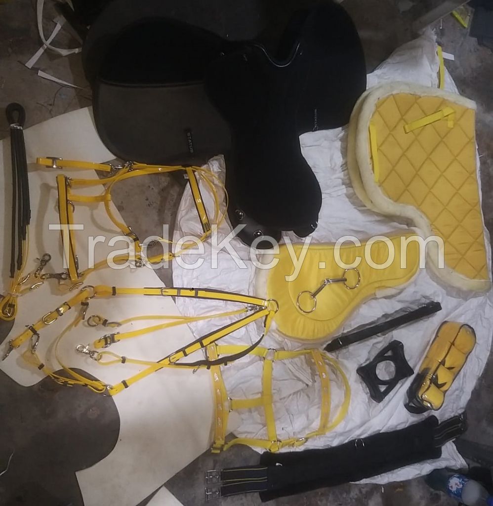 Genuine imported material status synthetic saddle set with jumping saddle pad,bareback pad,girth,pvc bridle,pp bridle and breast plate,plastic stirrups and steel bits,bandages