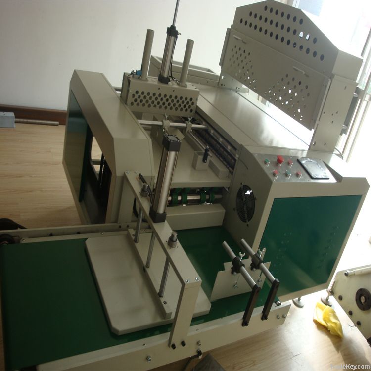 Plastic bag folding machine