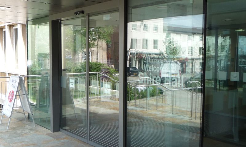 Automatic sliding glass door