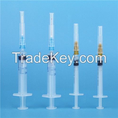 Safety auto-disable syringe