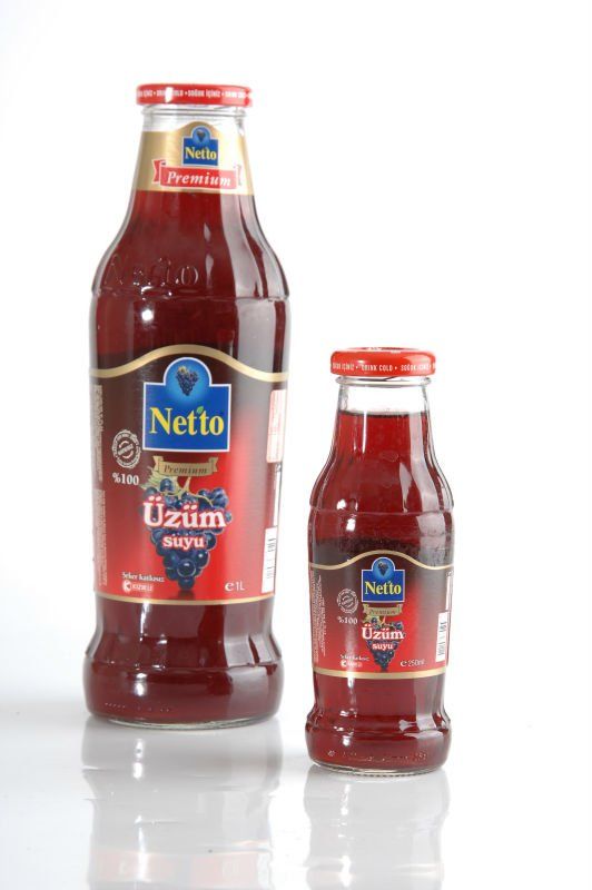Netto Premium %100 fruit juices in glass bottle