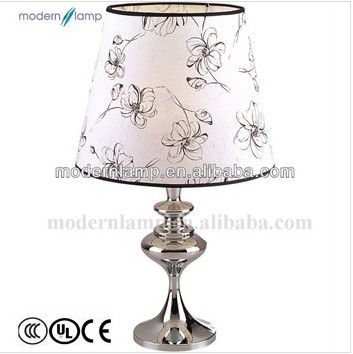 Noble desk lamp with a lacy shade 