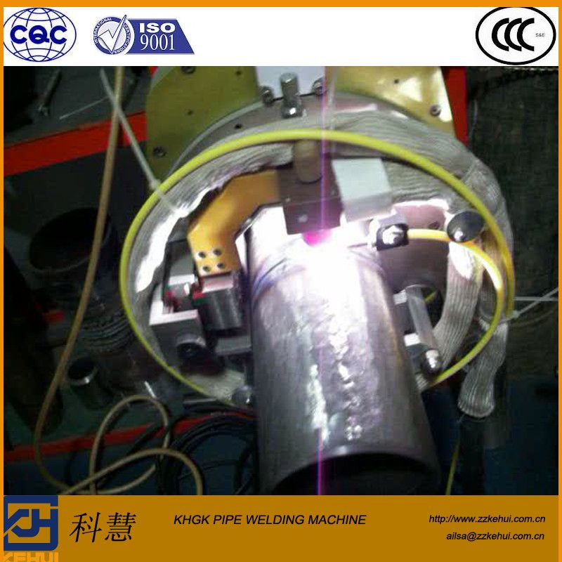 Automatic welding machine with open head for pipe girth joint