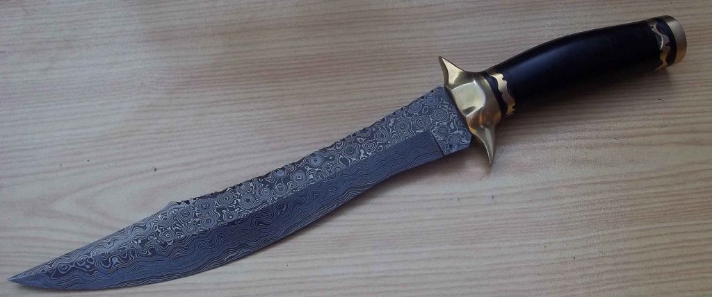 Damascus knife with bolster bone handle