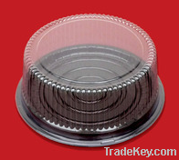 Vacuum formed plastic clamshell packaging for cakes