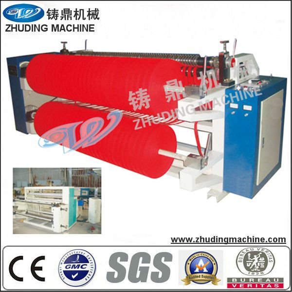 NON WOVEN FABRIC SLITTING MACHINE