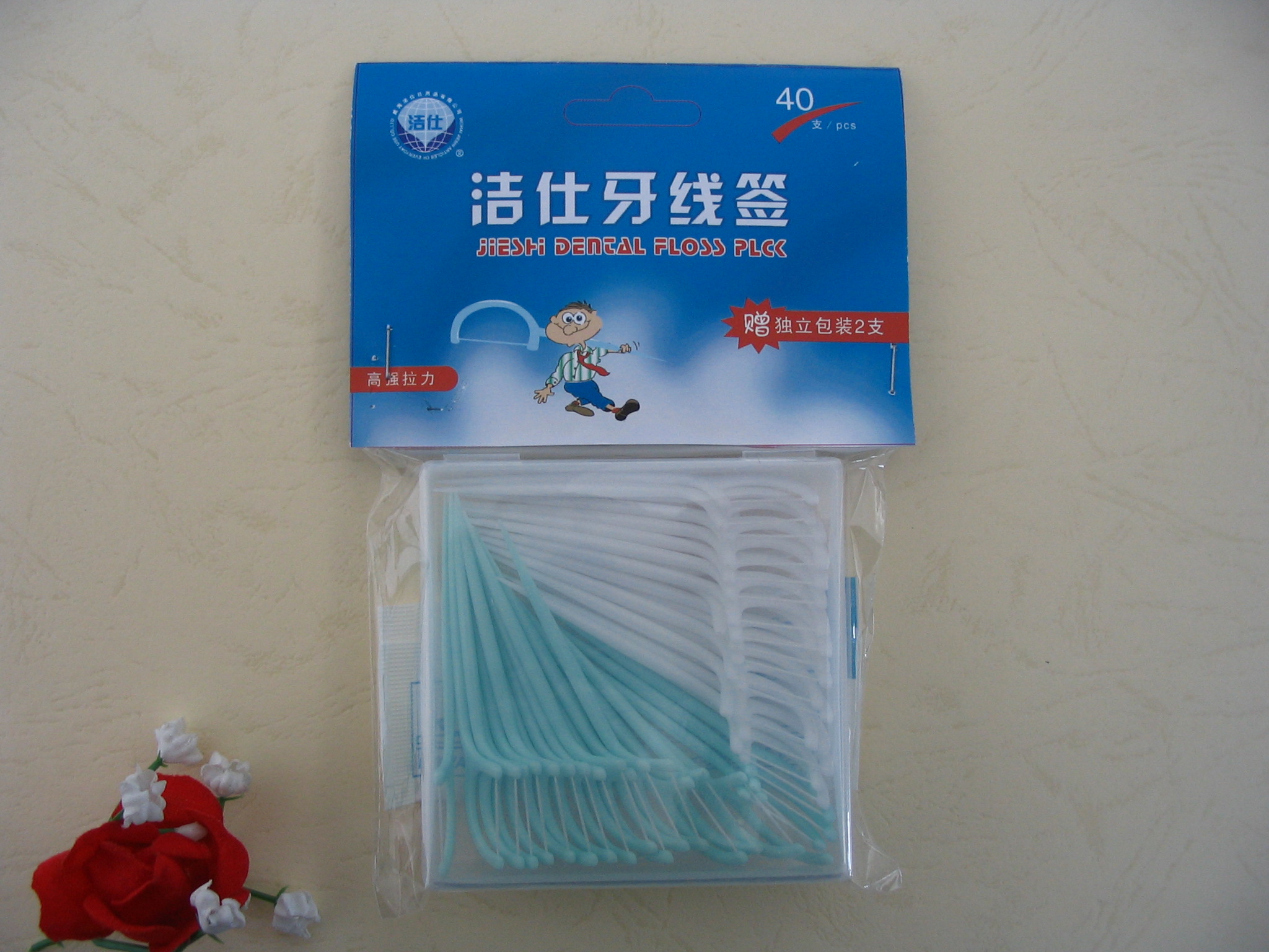 dental floss pick with square container