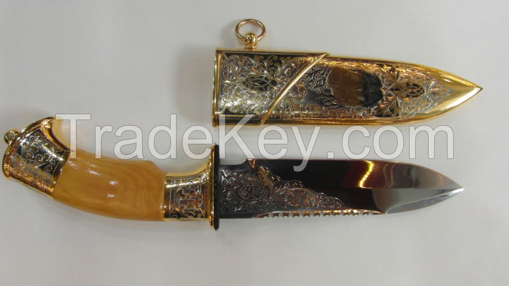 The knife souvenir, decorated in all-metal sheath