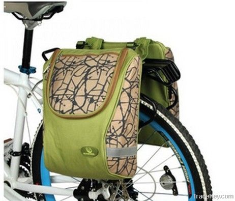 Bicycle with double picnic bag containing aluminum foil warehouse and