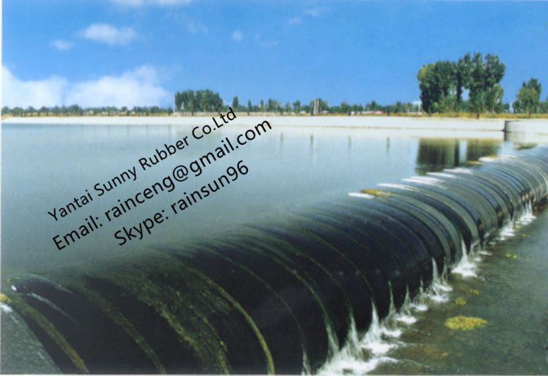 Inflatable flexible membrane dam