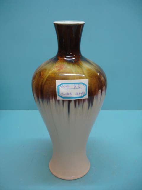 Chinese red porcelain vase, festive ceramic decoration