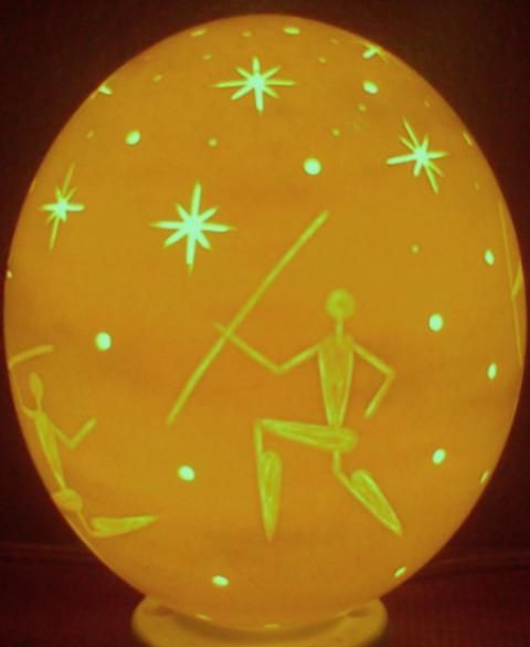 Stars and bushmen rock art hand carved ostrich egg lamp shade