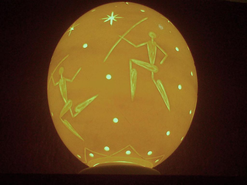 Stars and bushmen rock art hand carved ostrich egg lamp shade