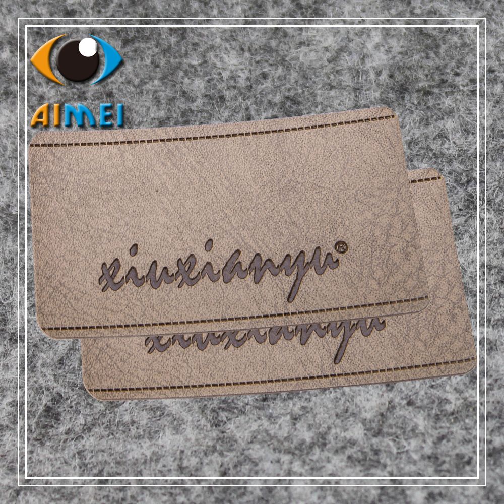 Customized leather labels for clothing brand name Leather Garment tag custom handmade jeans Label stitched tags tissue marker