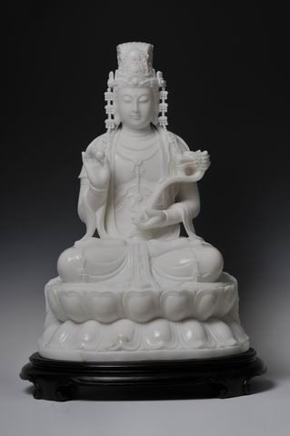 white mabble religious buddha status