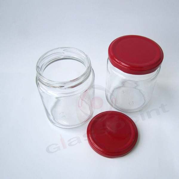 Round glass jars for honey, jam 