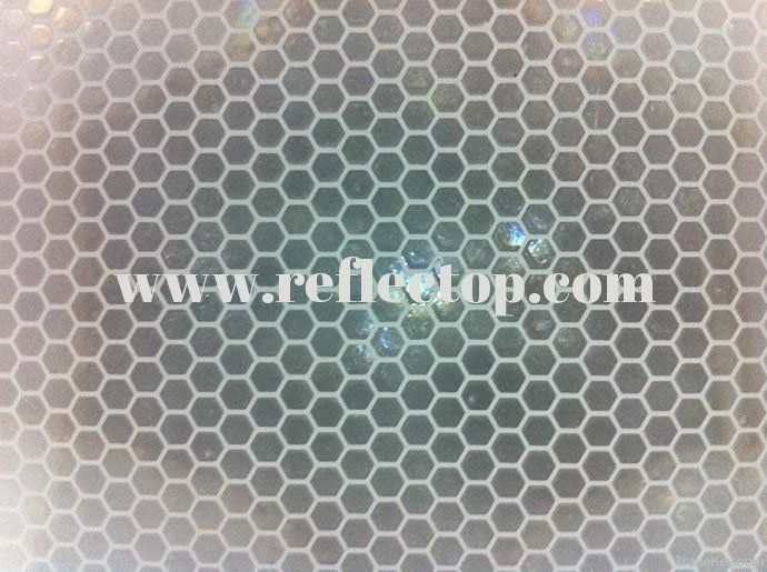 Prismatic reflective film