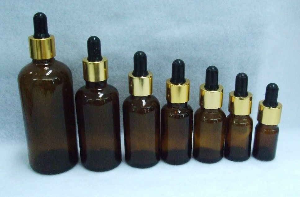 amber glass bottles of essential oil