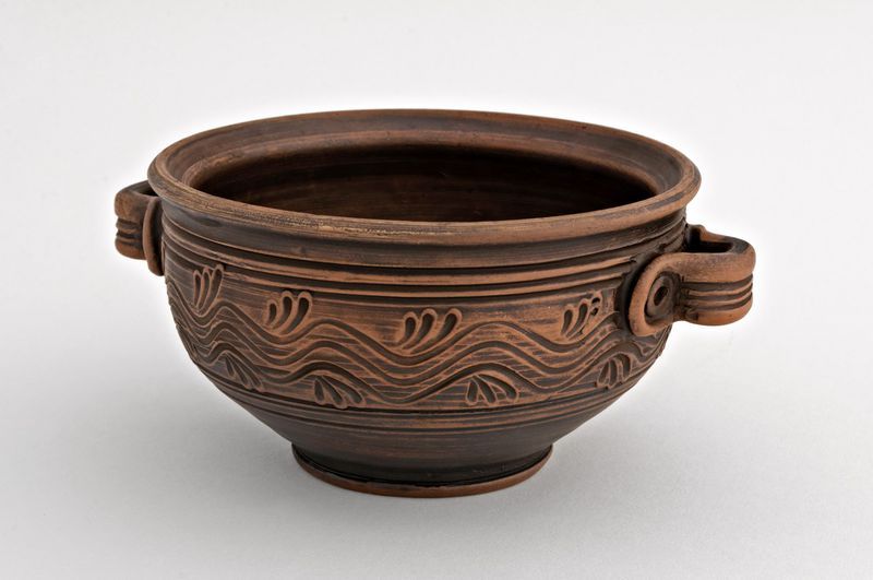 Ceramic clay bowl made of red clay.