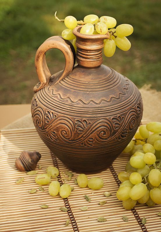 Clay jug with lid.