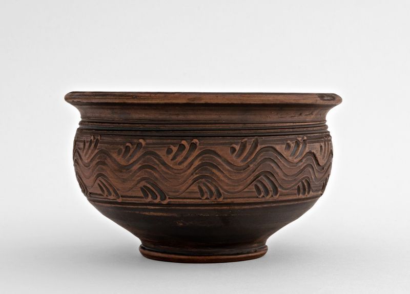Ceramic clay bowl made of red clay.