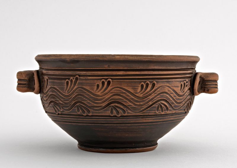 Ceramic clay bowl made of red clay.