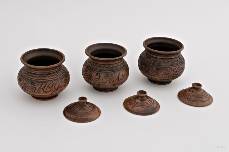 Ceramic pot set of three pots made of red clay. 