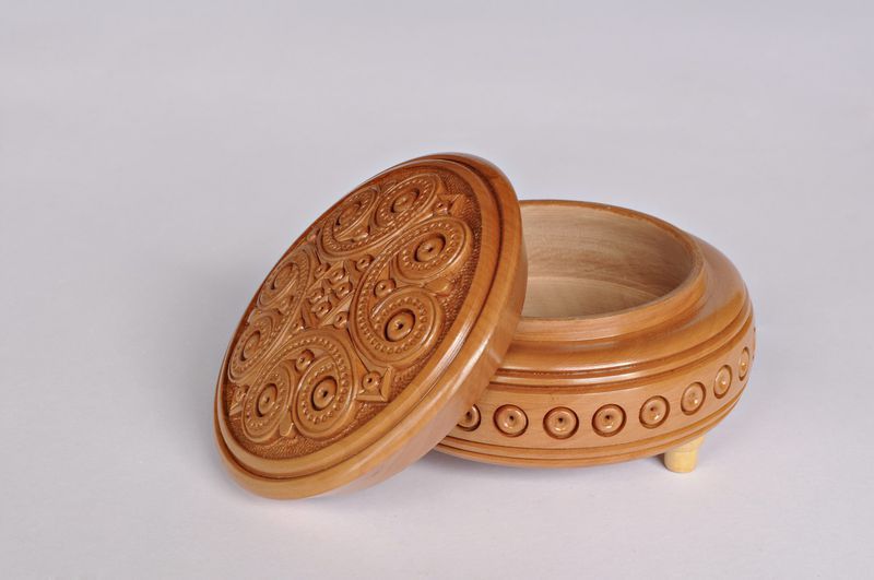 Handmade wooden round decorative jewelry box.