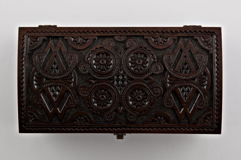 Hand carved wooden jewelry brown box.