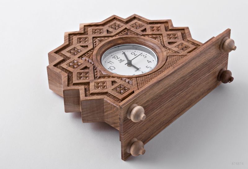 Desk wooden clock with hand carved pattern.