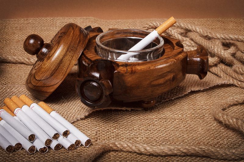 Wooden table ashtray made by hands.
