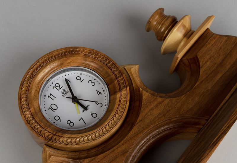 Desk wooden clock with candlestick.