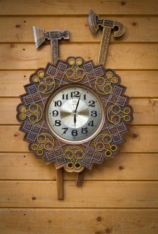 Wall clock with two axes.