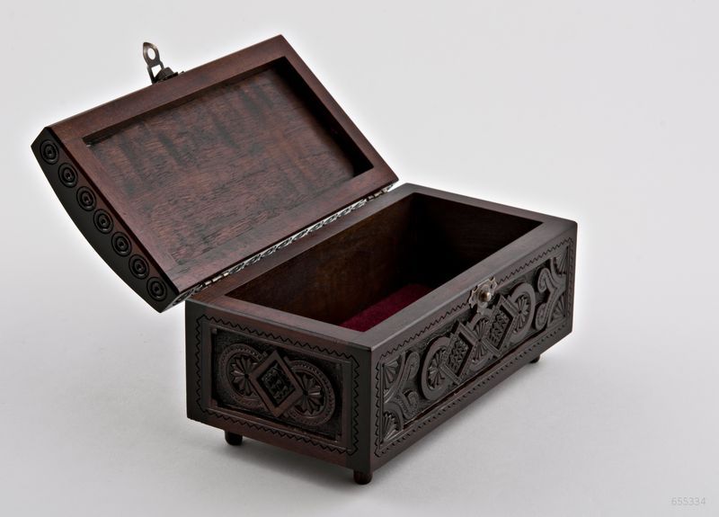 Hand carved wooden jewelry brown box.
