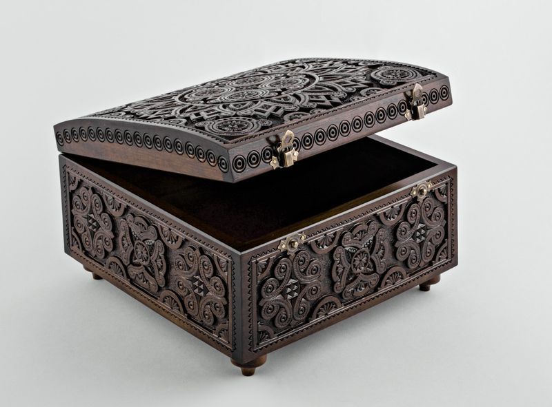 Carved wooden box for needlework