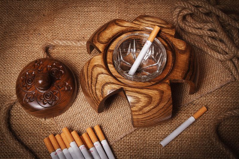 Wooden table ashtray made by hands.