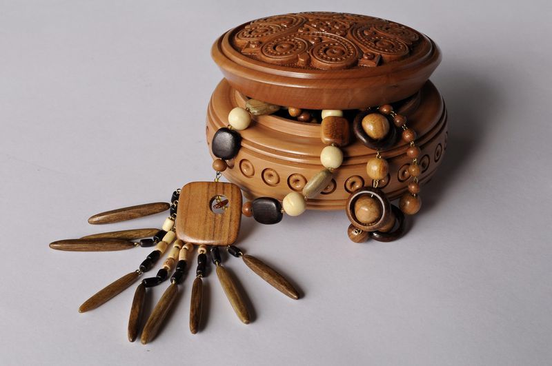 Handmade wooden round decorative jewelry box.