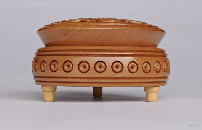 Handmade wooden round decorative jewelry box.