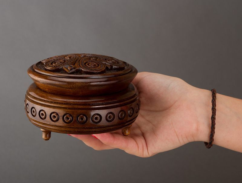 Hand carved round wooden brown jewelry box