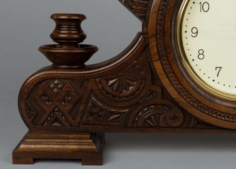 Desk wooden clock with hand carved pattern.